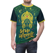Person wearing a green and yellow t-shirt with a deity design and text.