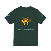 Brown t-shirt with a yellow and orange graphic of a Pokémon on the back, featuring the text 'Who is that Pokémon?'