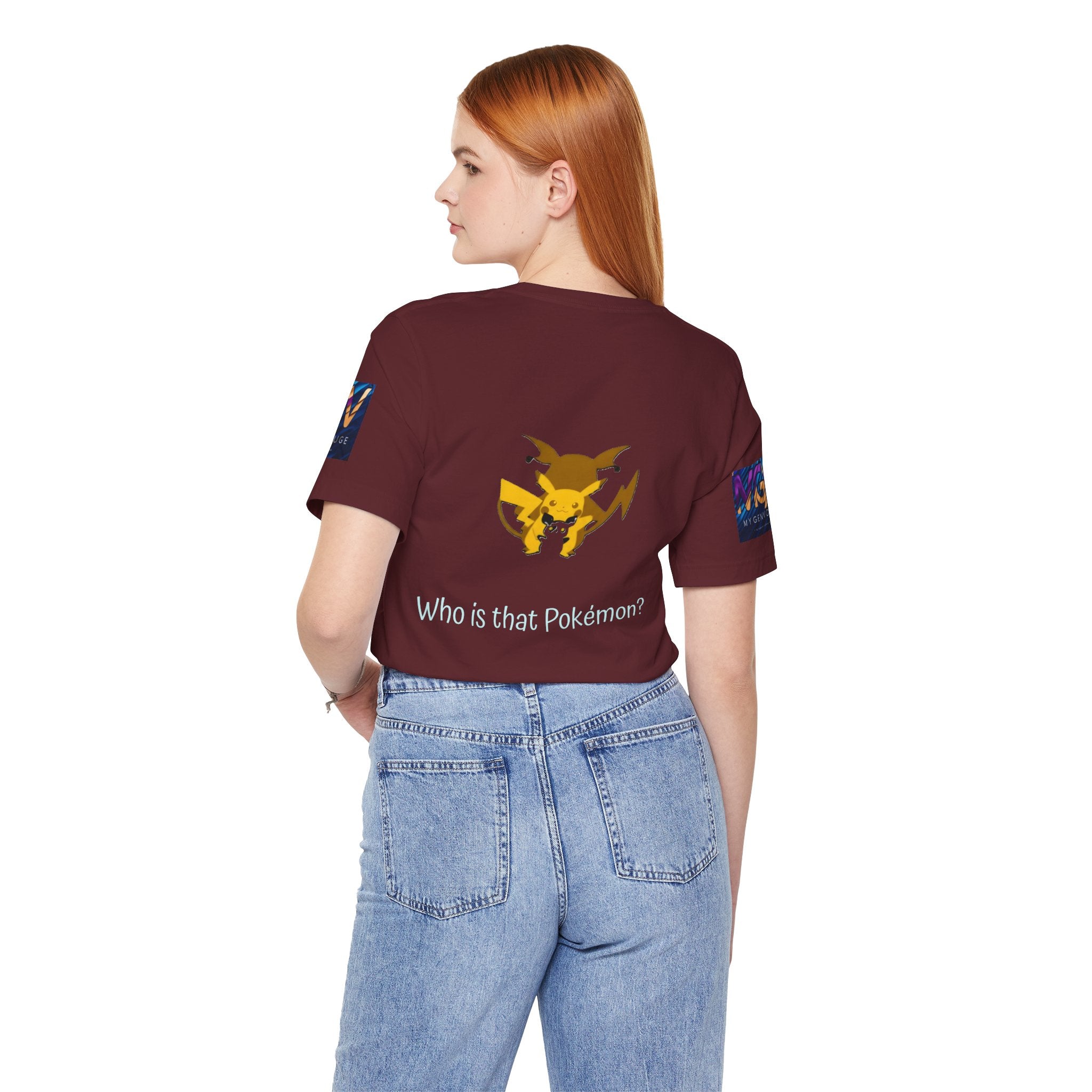 Person wearing a maroon t-shirt with a graphic and text, standing against a white background