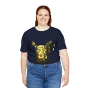 Person wearing a navy blue t-shirt with a gold deer design on a white background