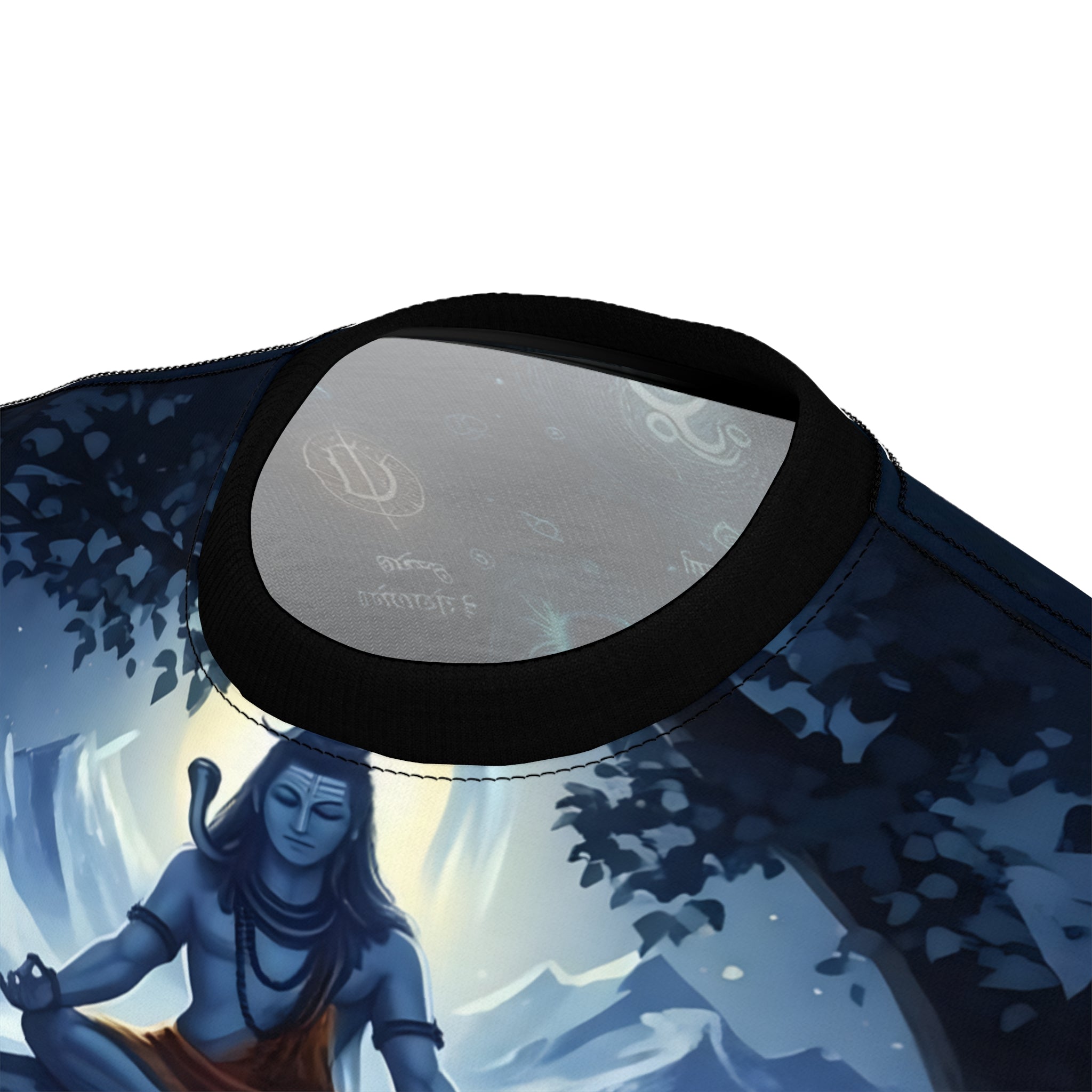 Product with a design of a seated figure in a natural setting, featuring mountains and trees.