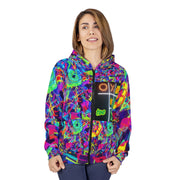 Person wearing a colorful jacket with a visible brand logo on a white background